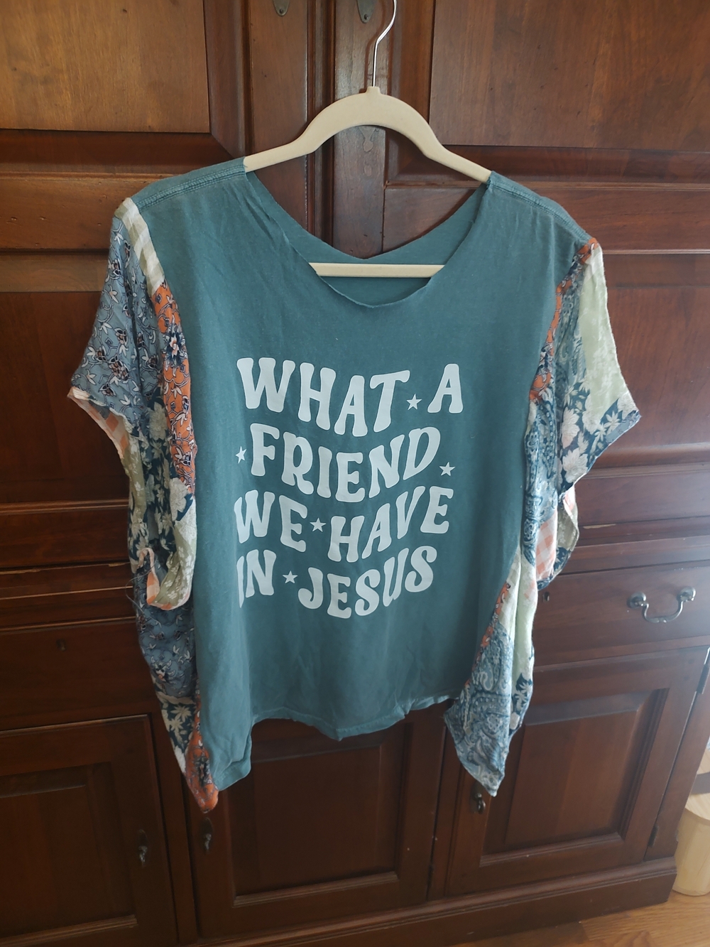 Women’s Teal Graphic Tunic Top with Mixed-Print Flutter Sleeves
